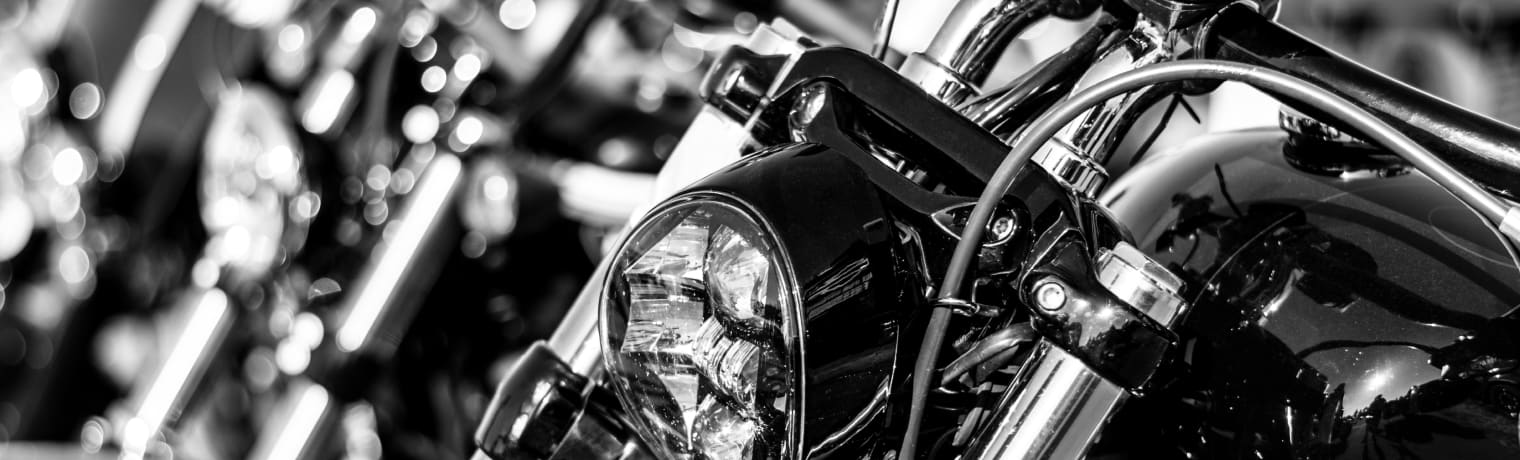 Photo of a line of parked motorcycles