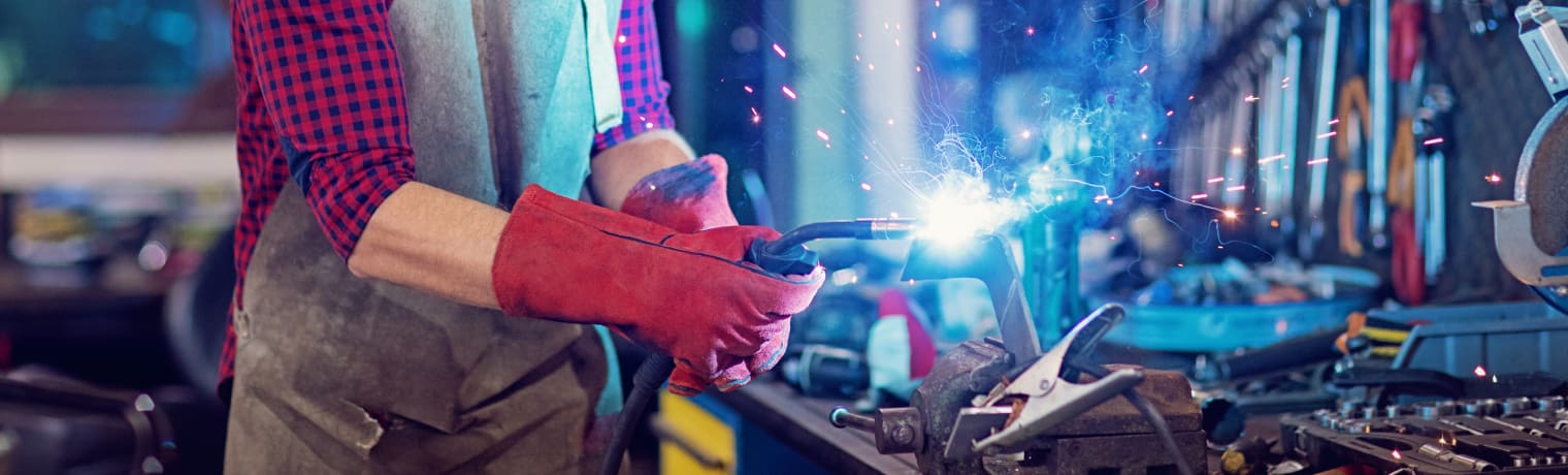 Photo of a person welding